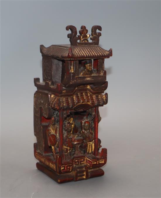 A Chinese gilt and red lacquered temple carving height 19cm